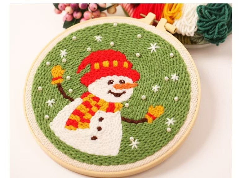 Christmas Punch Needle Embroidery Kit with festive designs including Santa, snowmen, and Christmas tree