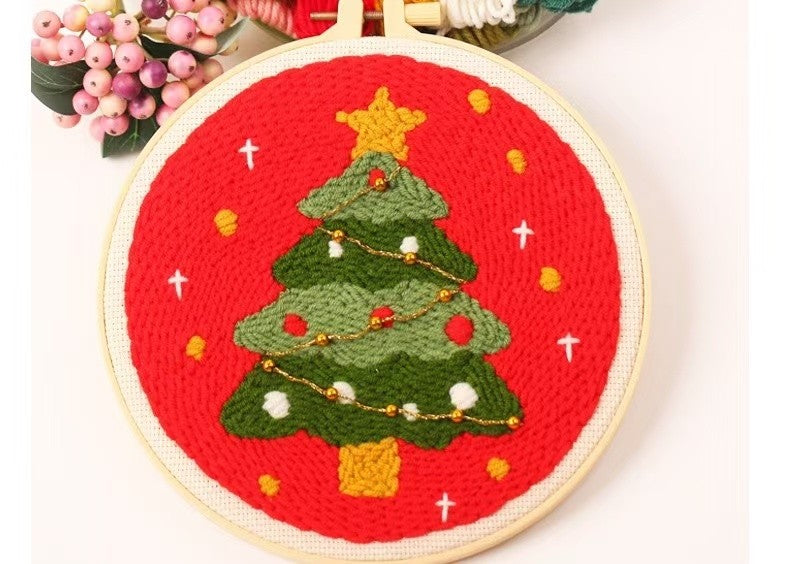 Christmas Punch Needle Embroidery Kit with festive designs including Santa, snowmen, and Christmas tree