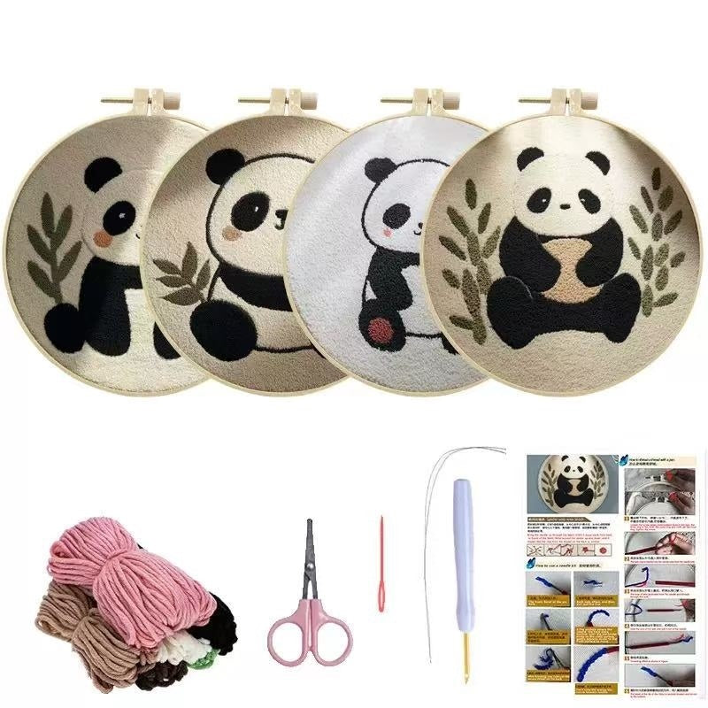 Embroidery hoops with panda designs, yarn, scissors, needle, and instructions