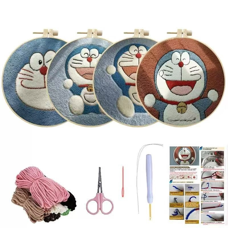 Punch Needle Embroidery hoops with cartoon character Doraemon design, yarn, scissors, needle, and instructions on a white background