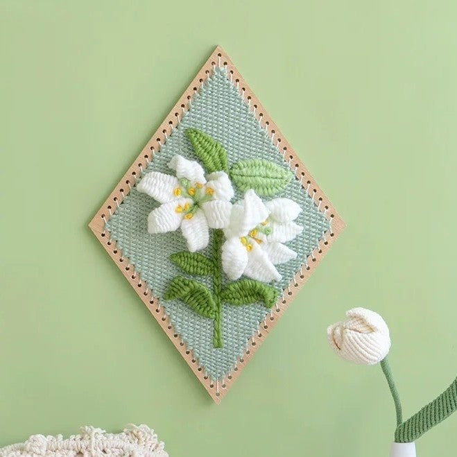 image displaying a finished Lily Flower Weaving Loom Kit on