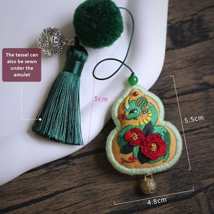 dimensions of the Completed Snake embroidery Fortune Charm