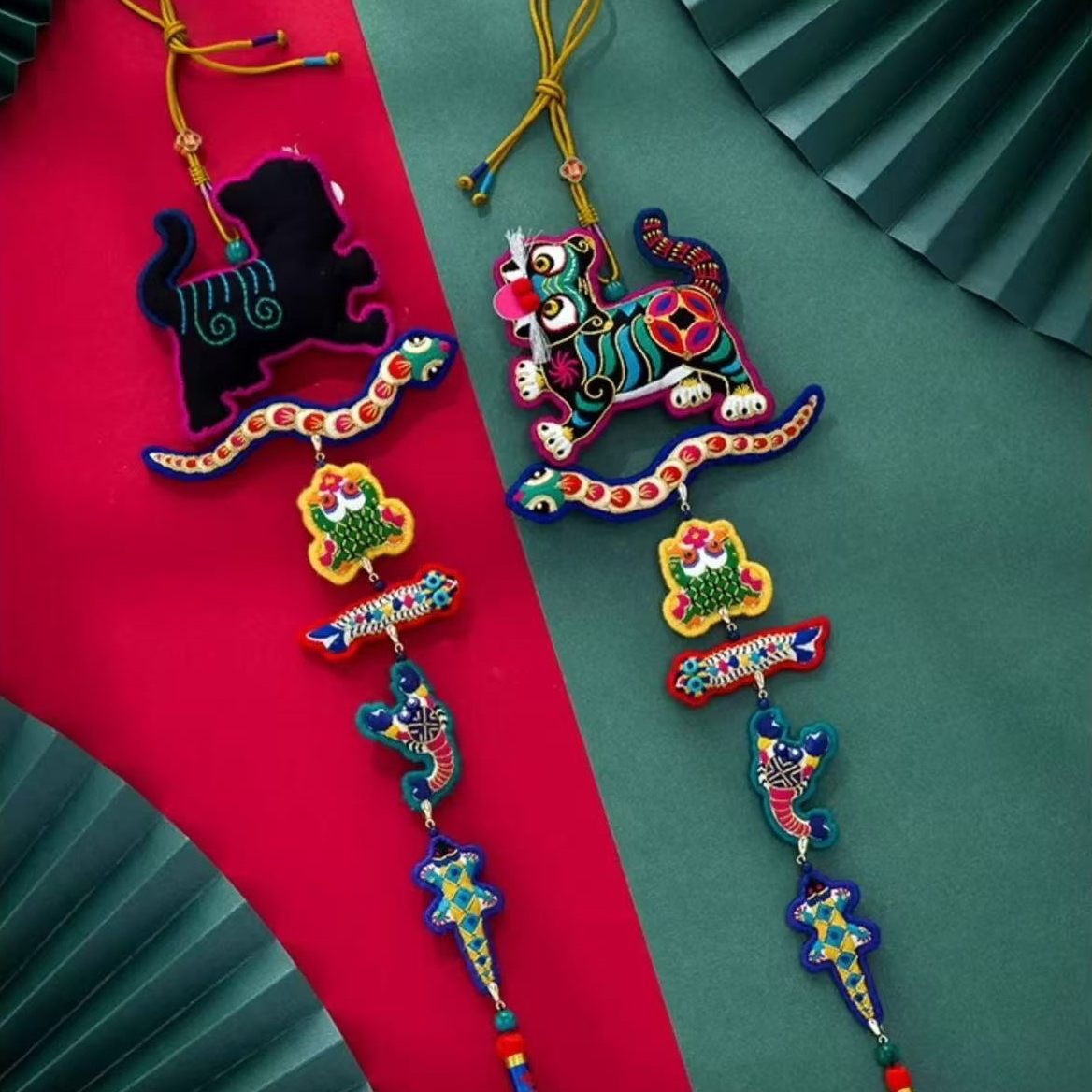 front side and reverse side of Colorful decorative hanging ornaments with tiger and five poisonous creatures design