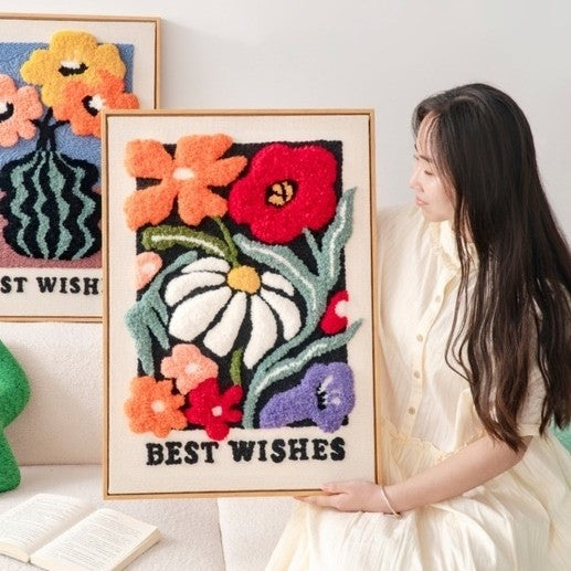 image displaying the finished Wildflower Punch Needle Kit holding in hands