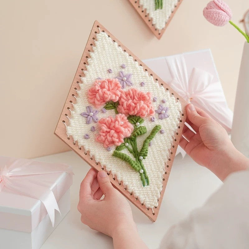 image the finished Carnation Flower Weaving Kit holding in hands