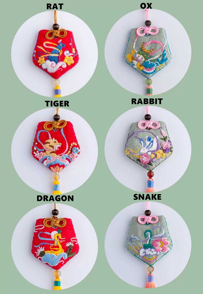 image displaying the finished 12 Chinese Zodiac Amulet Fortune Charm Hand Embroidery Kits