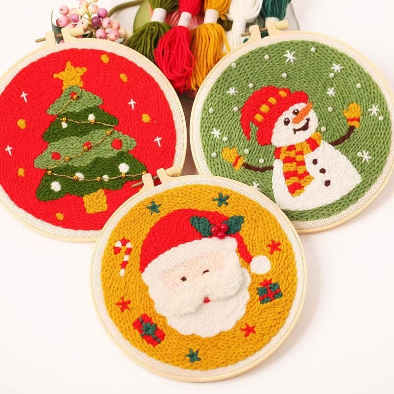 Christmas Punch Needle Embroidery Kit with festive designs including Santa, snowmen, and Christmas tree