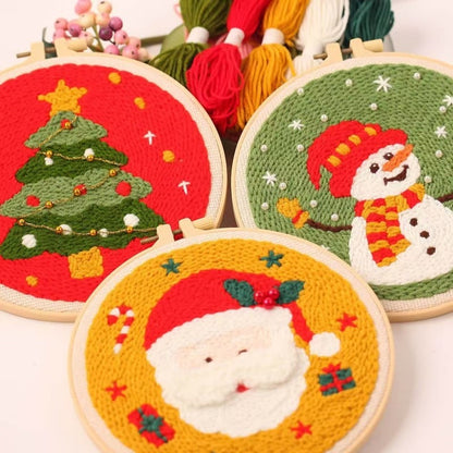 Christmas Punch Needle Embroidery Kit with festive designs including Santa, snowmen, and Christmas tree