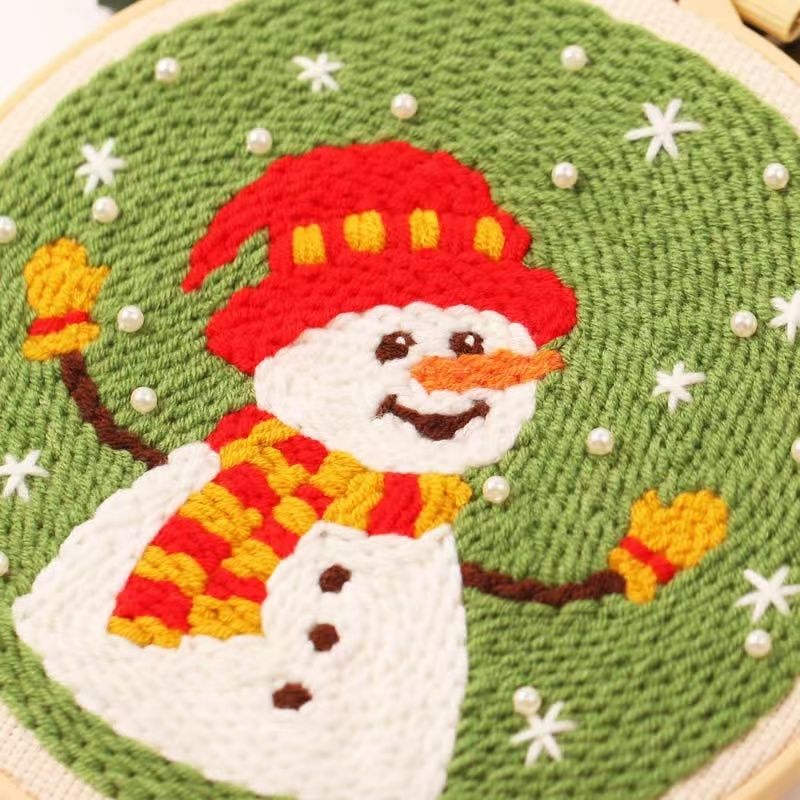 Christmas Punch Needle Embroidery Kit with festive designs including Santa, snowmen, and Christmas tree