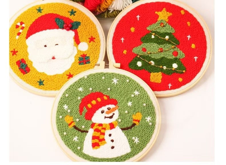 Christmas Punch Needle Embroidery Kit with festive designs including Santa, snowmen, and Christmas tree