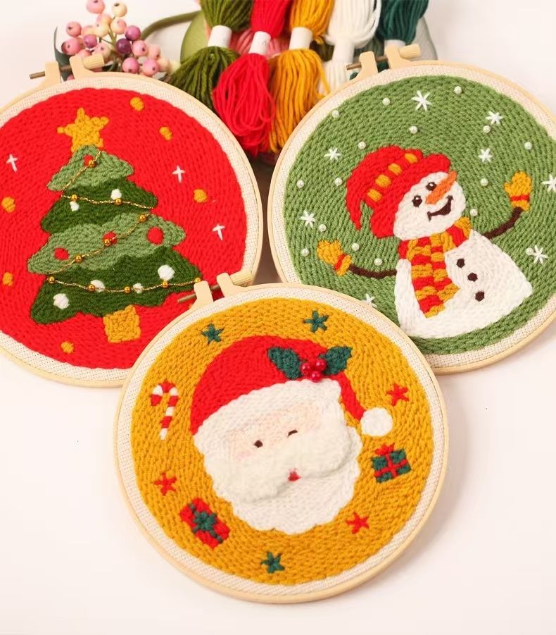 Christmas Punch Needle Embroidery Kit with festive designs including Santa, snowmen, and Christmas tree