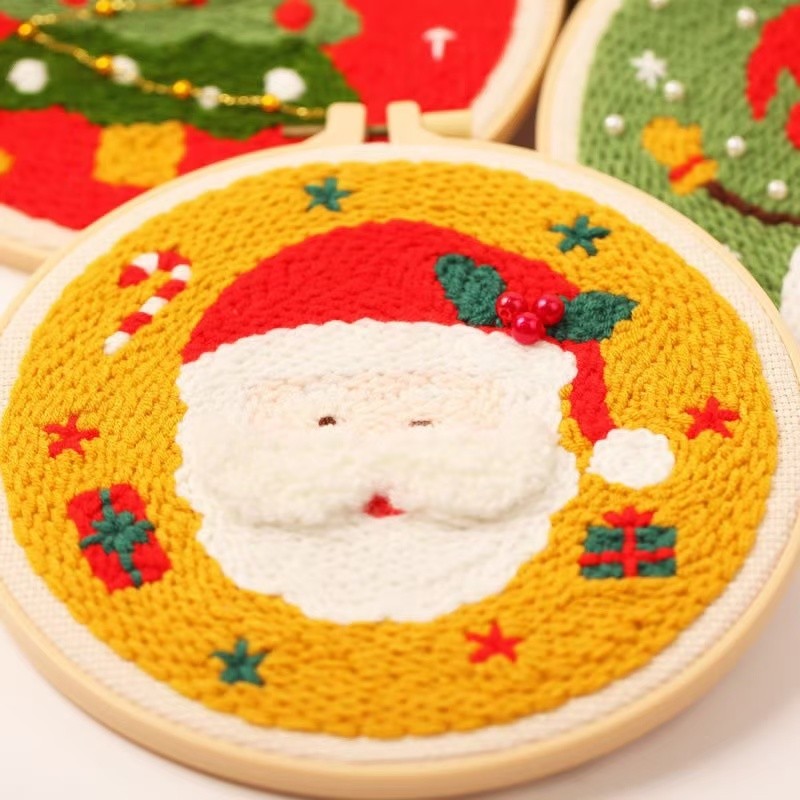 Christmas Punch Needle Embroidery Kit with festive designs including Santa, snowmen, and Christmas tree