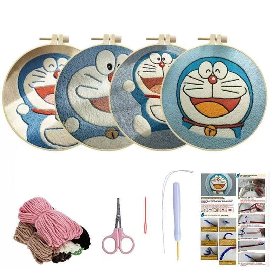 Embroidery hoops with cartoon character Doraemon design, yarn, scissors, needle, and instructions