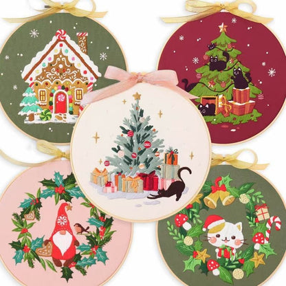 Christmas DIY Hand Embroidery Kit featuring holiday designs, including gingerbread houses, Christmas trees, wreaths, santa and festive kittens