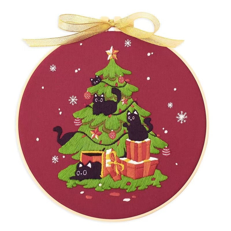 Christmas Tree DIY Hand Embroidery Kit featuring holiday designs, including gingerbread houses, Christmas trees, wreaths, santa and festive kittens