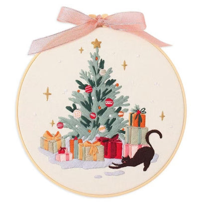 Christmas DIY Hand Embroidery Kit featuring holiday designs, including gingerbread houses, Christmas trees, wreaths, santa and festive kittens