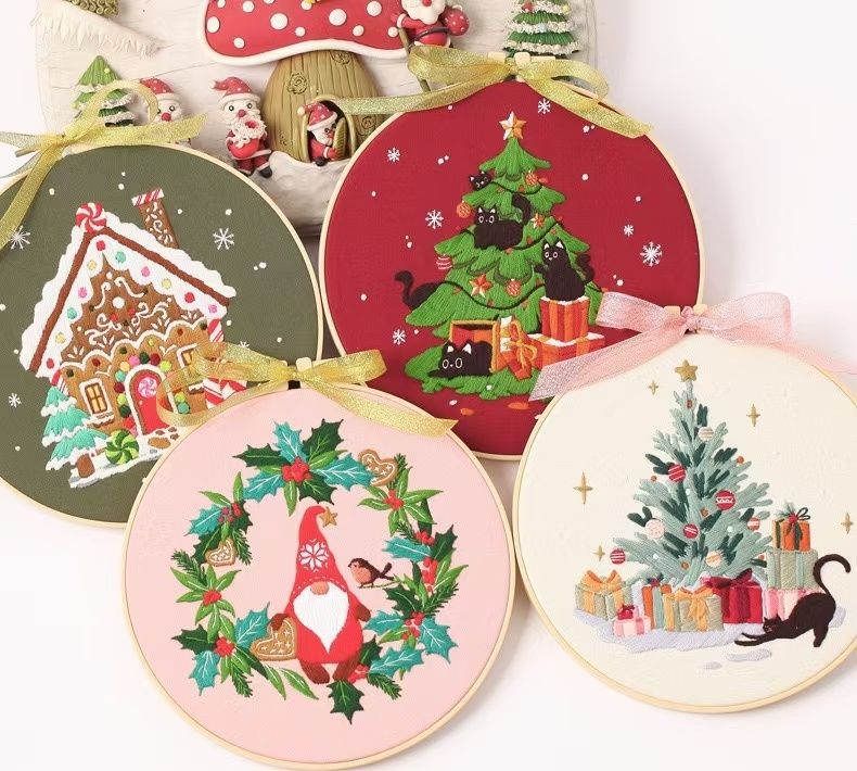 Christmas DIY Hand Embroidery Kit featuring holiday designs, including gingerbread houses, Christmas trees, wreaths, santa and festive kittens