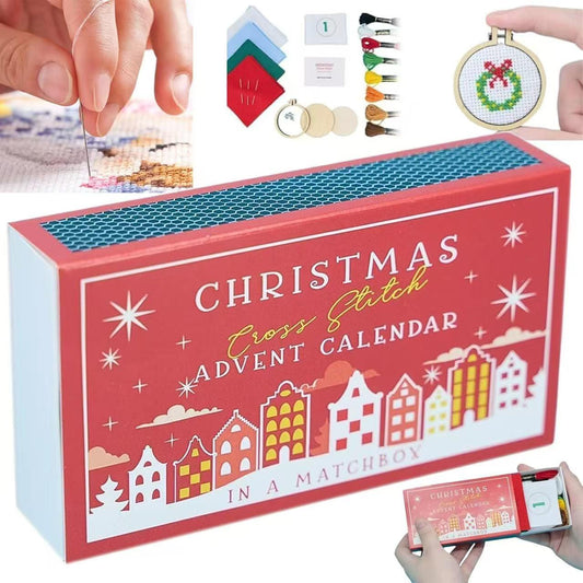 Christmas Cross Stitch Advent Calendar packaging with small cross-stitching materials displayed above.
