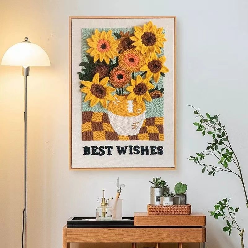 the finished Sunflower Punch Needle Kit hang on the wall as a home decoration