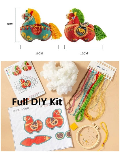 Full DIY kit with embroidered horse designs, threads, and instructions on a wooden surface.