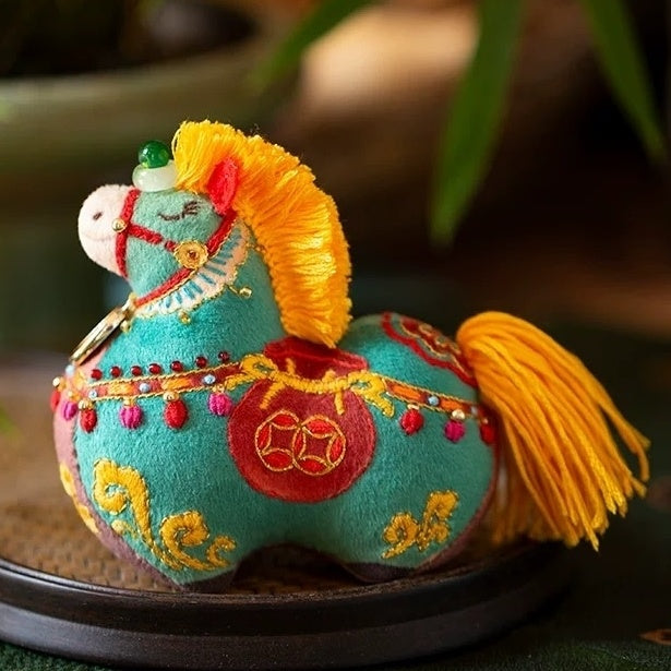 Colorful embroidered horse doll with auspicious symbols