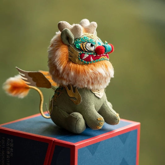 Plush embroidered toy Chinese beast Kylin figure on a gift box